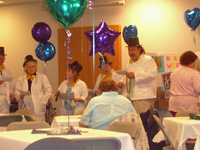 Wilbert singing with the nurses at the Nurses Appreciation Luncheon & Awards Ceremony (05/10/07). Click on image to see larger size in a new window.