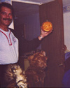 Rocky holding Foofer's first Halloween pumpkin (10/31/97).