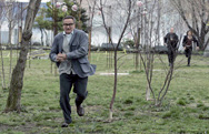 Robin Williams running in the final scene of "Authority" episode. Photo copyright NBC.